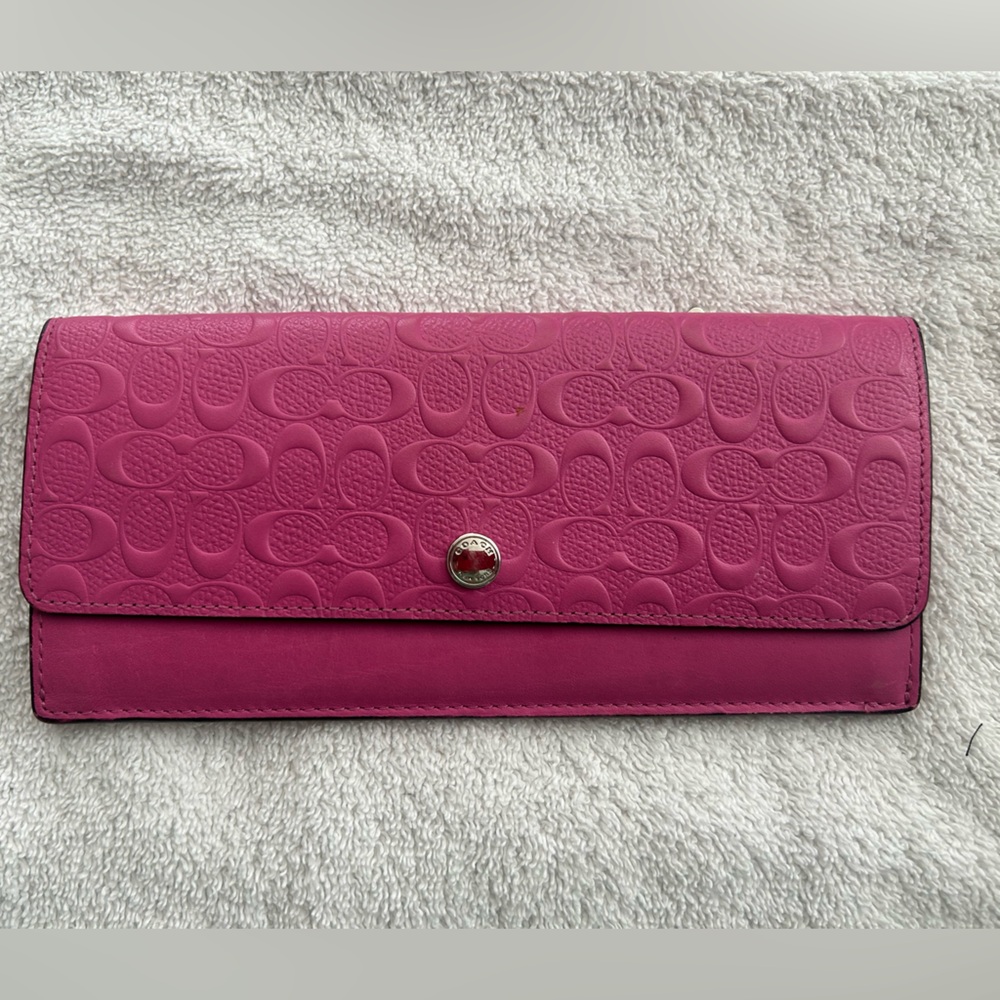 COACH embossed slim envelope wallet in pink leather
